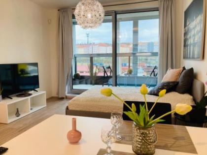 Apartement Blanc Harfa design - image 18