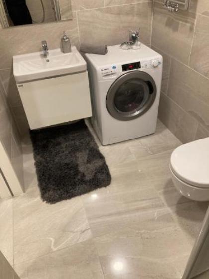 Apartement Blanc Harfa design - image 20